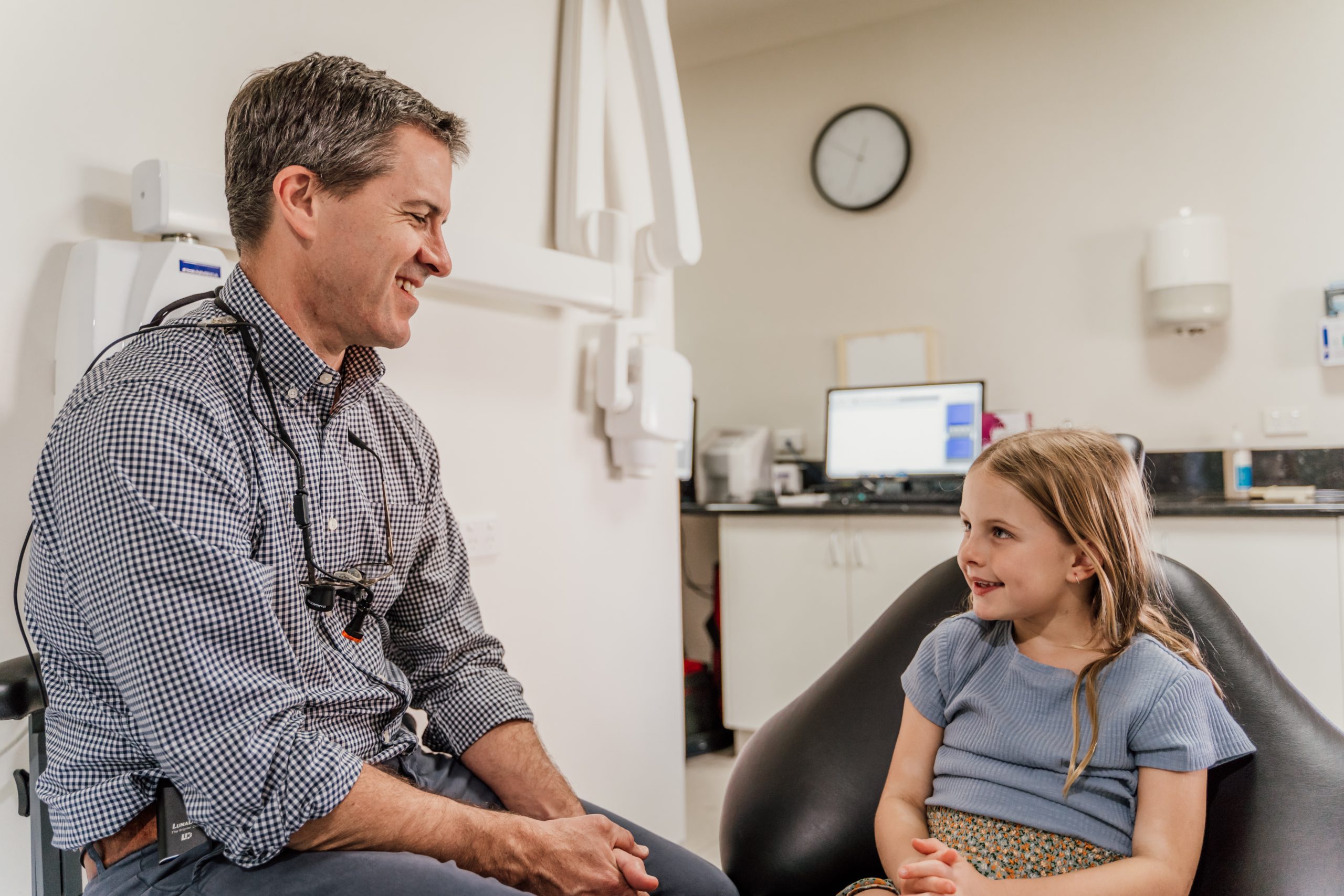 dentist talking with child